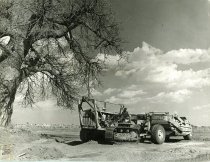 Williamson Diamond Mine (tractor-drawn scraper leveling ground)