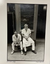 Two Men Outside of a Shirtmaker