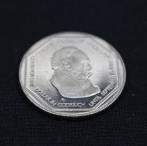 Head side of Tiger Dunlop coin