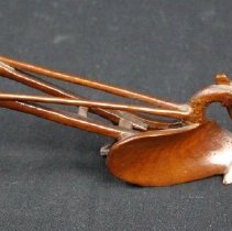 side view of plough carving