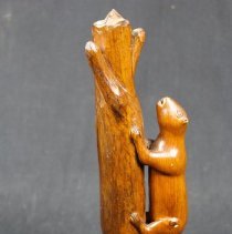 side view of squirrel on tree