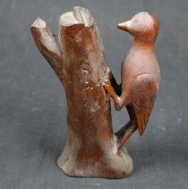 side view of woodpecker carving