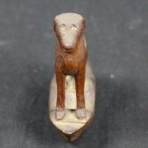 front view of dog carving