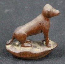 side view of dog carving