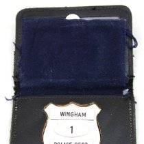 Wingham PD badge inside holder