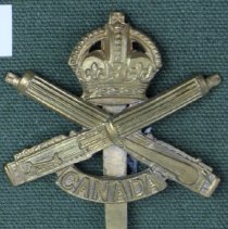 Machine Gun Unit Lapel Badge issued to James H. Currie