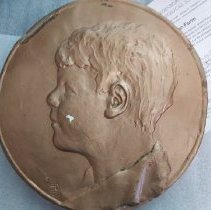 Plaster plaque of Forrest Doucette by his father Aime, 1927