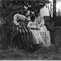 Outdoor informal portrait --group 2 women and child
