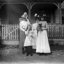 Group of Women in Hats with Child