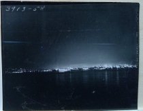 Ferry and waterfront at night