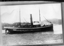 Steam Tug, Wallowa (1889), aground at low tide