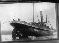 Steam Tug, Wallowa (1889), aground. Later rebuilt and renamed, Arthur Foss