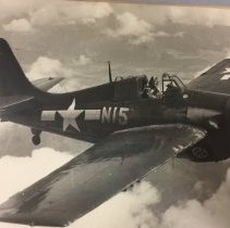 Adrian B. Allsion flying a Wildcat fighter plane (ca. 1942-1945)