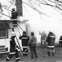 Ron Bell and firemen at a house fire (ca. 1965-1975)