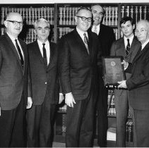 Arthur W. Allen receiving award and members of Hastings & Allen law firm