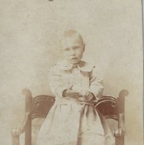 Child in Baldwin family photo album (ca. 1880-1890)