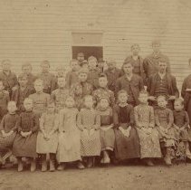 Elmer E. Hastings and school children (ca. 1895-1900)