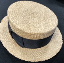 Straw Stetson Skimmer hat.