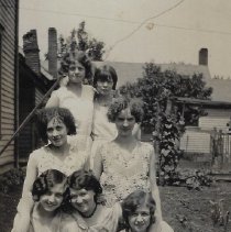 Seven women in Baker family photo album (ca. 1920-1930)
