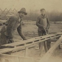 Fred Taylor & another man at construction site (ca. 1925-1935)