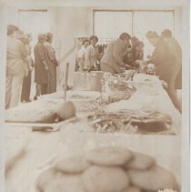 Chris and Sarah Allison in group at buffet