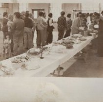 Chris Sarah and Judy Allison in group at buffet (ca. 1976)