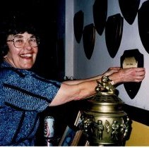 Eleanor Boyd Phillippe hanging O'Neall Plaque (ca. 1989)
