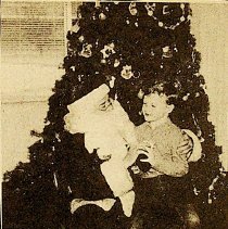 Nicholas Gress sitting on Santa's lap (1993)