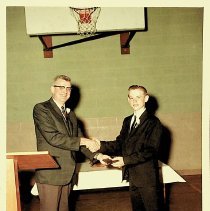 Bill Clark receiving an award at Veale Elementary School (ca. 1964-1967)