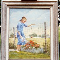 Amish girl with watering can