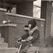 Carl Luder riding a bike (1930)