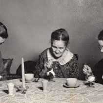 Carl Luder having desert with his mother & grandmother (ca. 1938)
