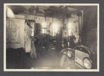 Ed Switzenberg at garage with hearse