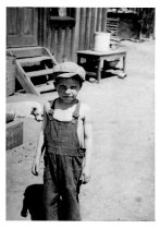 Boy in a Cap, by LaRue Spiker