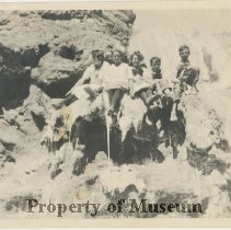 Children Seated on Overhang