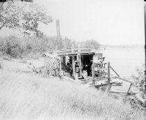 rundown steamboat used in logging industry