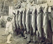 girl with line of fish