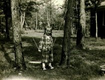 Girl in yard with rope
