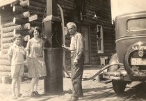 Robert, Dolly and Ella in front of first general store 1920s