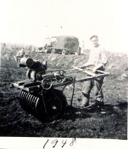Rolling in the spread vines to "plant" them