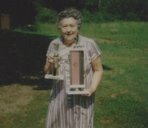 Anna May with trophies for ?