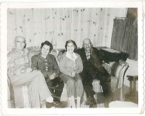 Merle & Evelyn Petersen (R), Mrs & Chief DeCoteau (L) 1957