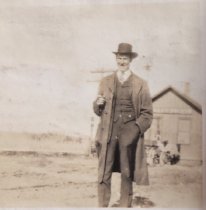 Grandpa Cap Smith at Manitowish depot  ca 1910s