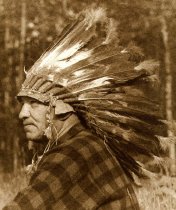Chief Bazil DeCoteau in traditional headdress