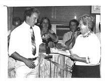ca 1984 Jim Bokern receives Beier Barefoot trophy from Marilyn Tisol