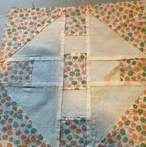 Churn Dash White On Orange And Green Floral D