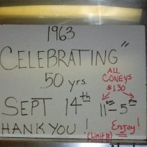 Delhi Chili 50th anniversary sign