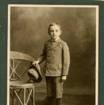 Young Elmer Myers in pin stripe suit with knickers and hat
