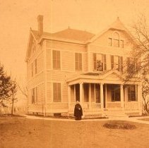 Father Joseph Sund in front of OLV Rectory 1907