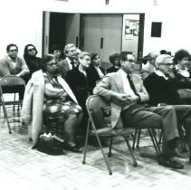 People sitting in chairs at Temple Beth-El